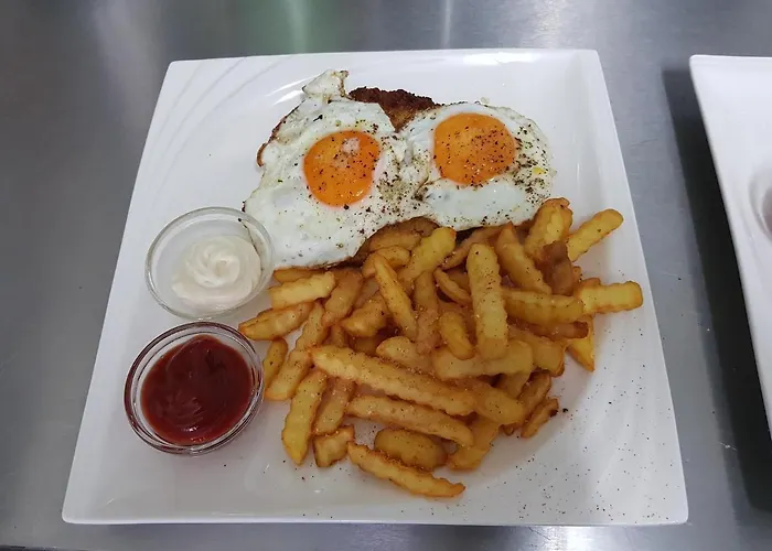 Maison d'hôtes Tattoo Mit Restaurant Und Tattoo-studio Mörtschach